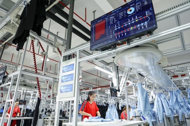 星空体育:触沃工控一体机驱动服装制造智能化转型:全链路解决方案与实践(图1)